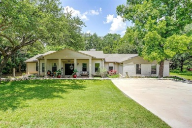 ENCHANTING 3-3-2 home nestled on a beautiful 1+ acre riverfront - Lake Home For Sale in Granbury, Texas