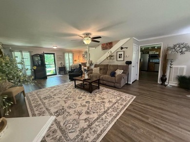 Situated on 4.06 acres in Bryant, Alabama, this Cape Cod-style - photo 24