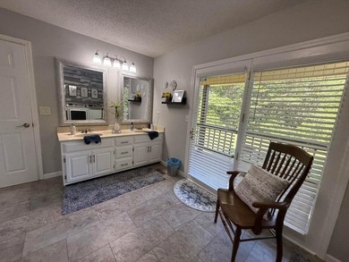 Situated on 4.06 acres in Bryant, Alabama, this Cape Cod-style - photo 42