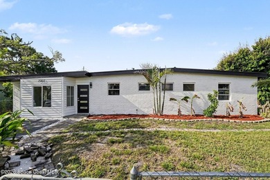 This gem is a must see! Situated on an oversized corner lot with - photo 3