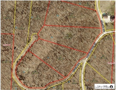 Discover more than 18 acres of beautiful wooded property at the - photo 3
