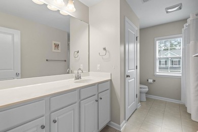 Four-bedroom, two-and-a-half-bathroom home with pond views and a - photo 11