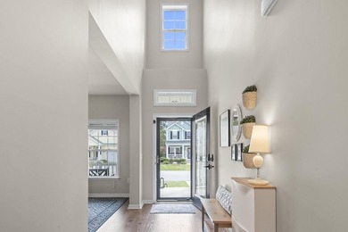 Four-bedroom, two-and-a-half-bathroom home with pond views and a - photo 12