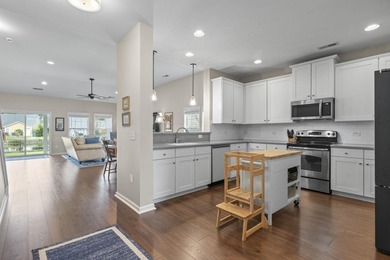 Four-bedroom, two-and-a-half-bathroom home with pond views and a - photo 14