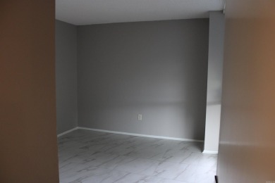 Updated and move-in ready 2nd floor condo featuring marble