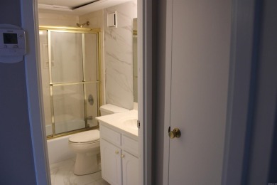 Updated and move-in ready 2nd floor condo featuring marble