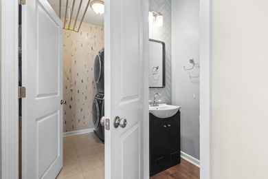 Four-bedroom, two-and-a-half-bathroom home with pond views and a - photo 26