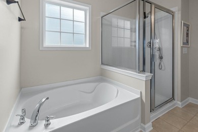 Four-bedroom, two-and-a-half-bathroom home with pond views and a - photo 31