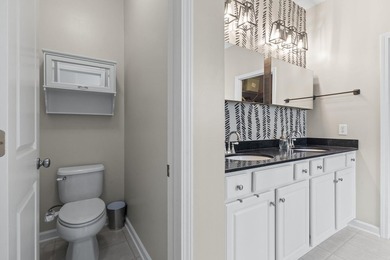 Four-bedroom, two-and-a-half-bathroom home with pond views and a - photo 32