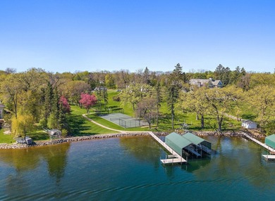 Commanding one of the most prestigious settings on Lake - photo 5
