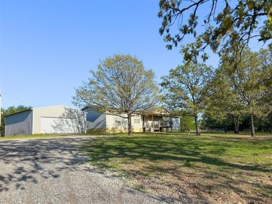 # Peaceful Country Living! Minutes from Atoka Lake! 5-acres with