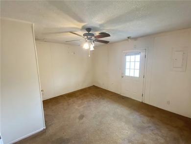 This four-side brick home in Rolling Acres subdivision has a lot - photo 9
