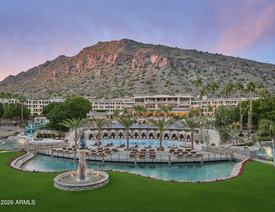Perched at the base of Camelback Mountain, this rare corner