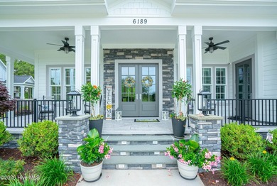 Welcome to 6189 Castlebrook Way, an exceptional custom-built - photo 9