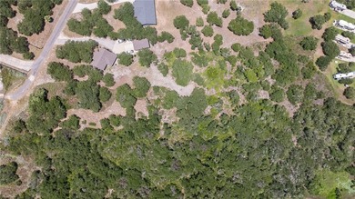 This lot has just under 2 acres of raw land that is located - photo 3
