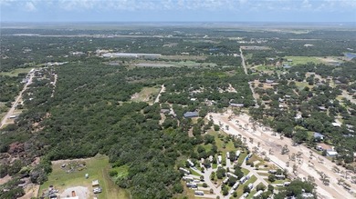 This lot has just under 2 acres of raw land that is located - photo 4