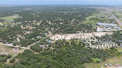 This lot has just under 2 acres of raw land that is located - photo 8