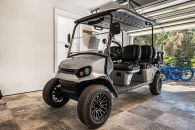 Two minute golf cart ride to street parking in front of the - photo 60