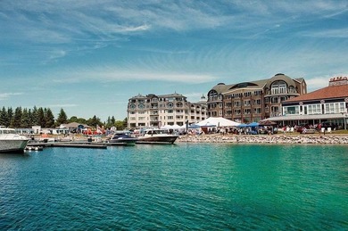 This Bay Harbor condo is perfect for year-round retreats. It - photo 1