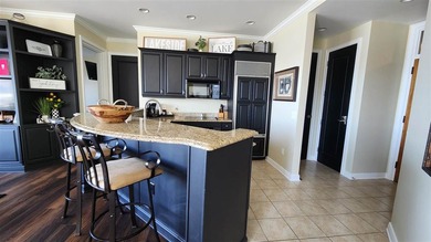 This Bay Harbor condo is perfect for year-round retreats. It - photo 4