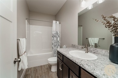 Bright, open & impeccably maintained! The upscale living room