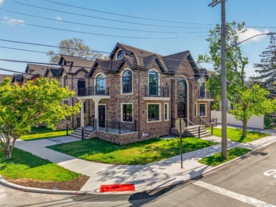 This exquisite corner-lot residence in prime Bayside features a - photo 1