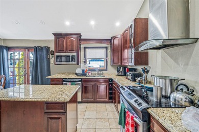 Step inside this exceptional split-level residence, From the - photo 7
