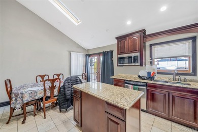 Step inside this exceptional split-level residence, From the - photo 8