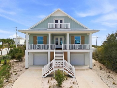Experience elevated coastal living at 425 Gulfview Ln., a newly - photo 1