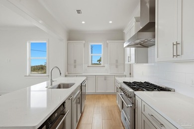 Experience elevated coastal living at 425 Gulfview Ln., a newly - photo 7