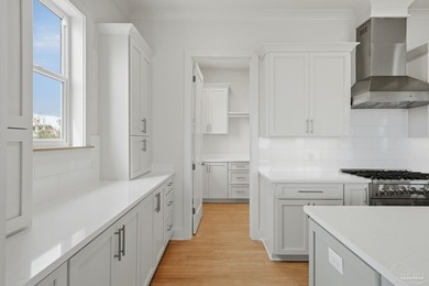 Experience elevated coastal living at 425 Gulfview Ln., a newly - photo 10