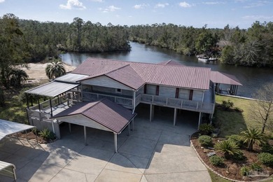 Waterfront living meets space, privacy, and functionality at - photo 1