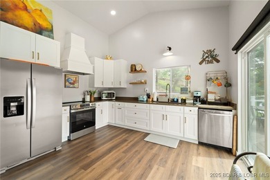 Delightful 4-Bedroom, 2-Bath Lakefront Getaway with Sweeping - photo 13