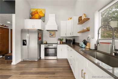 Delightful 4-Bedroom, 2-Bath Lakefront Getaway with Sweeping - photo 14