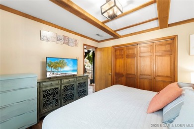 Delightful 4-Bedroom, 2-Bath Lakefront Getaway with Sweeping - photo 18