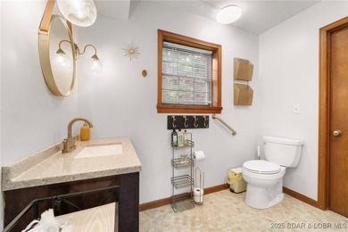 Delightful 4-Bedroom, 2-Bath Lakefront Getaway with Sweeping - photo 19