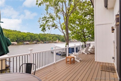 Delightful 4-Bedroom, 2-Bath Lakefront Getaway with Sweeping - photo 22
