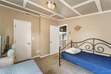 Delightful 4-Bedroom, 2-Bath Lakefront Getaway with Sweeping - photo 29