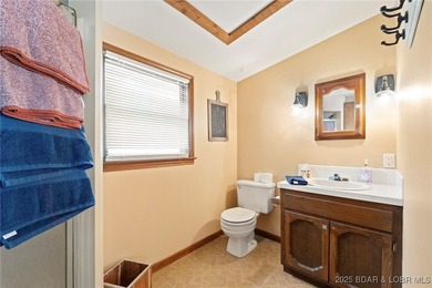 Delightful 4-Bedroom, 2-Bath Lakefront Getaway with Sweeping - photo 30
