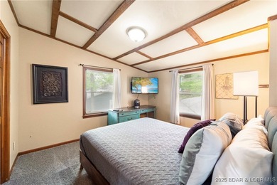 Delightful 4-Bedroom, 2-Bath Lakefront Getaway with Sweeping - photo 32