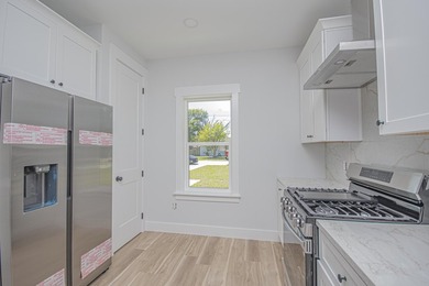 Step into this semi-custom home beautifully designed with plenty - photo 12