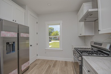 Step into this semi-custom home beautifully designed with plenty - photo 13