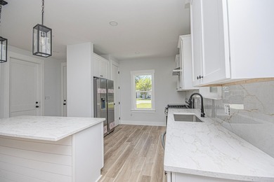 Step into this semi-custom home beautifully designed with plenty - photo 17