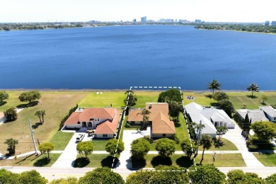Lake Home For Sale in West Palm Beach, Florida