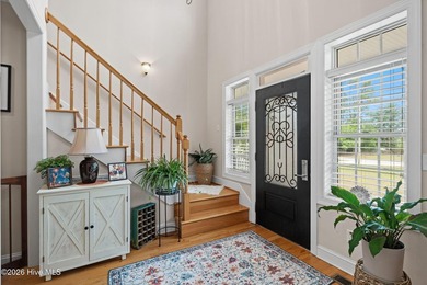 UPDATED PICTURES!! Enjoy exceptional golf course living from - photo 6