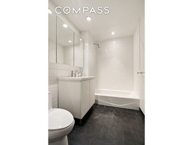 *Welcome to Residence 15F, a versatile and sleek 845-square-foot - photo 6