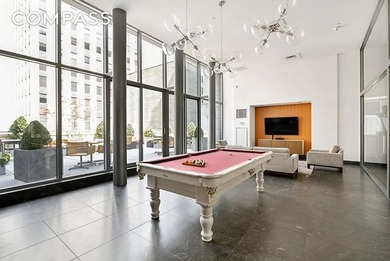 *Welcome to Residence 15F, a versatile and sleek 845-square-foot - photo 8