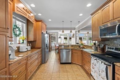 UPDATED PICTURES!! Enjoy exceptional golf course living from - photo 9
