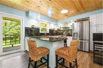 RIVER RETREAT! Over 1.2 acres! New real stone exterior! Whether - photo 17
