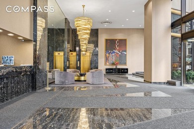 Welcome to 167 E 61st St, a stunning oversized 2-bedroom, 2 - photo 2